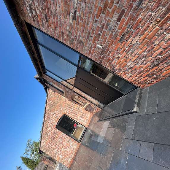Tarmac driveway installation in Manchester after garden wall removal
